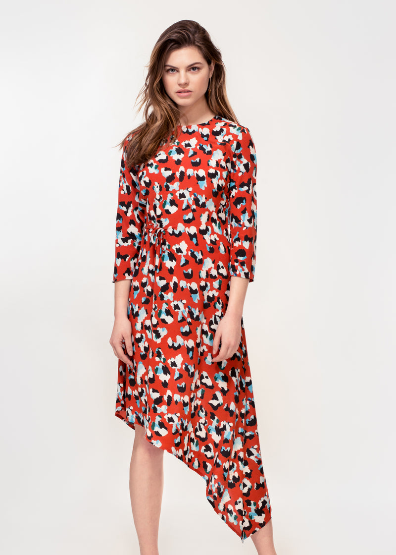 3/4 sleeve dress with asymmetric hem in a Red animal print