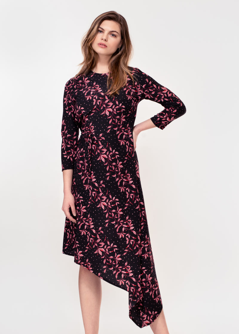 3/4 sleeve dress with asymmetric hem in a black ground pink leaf print