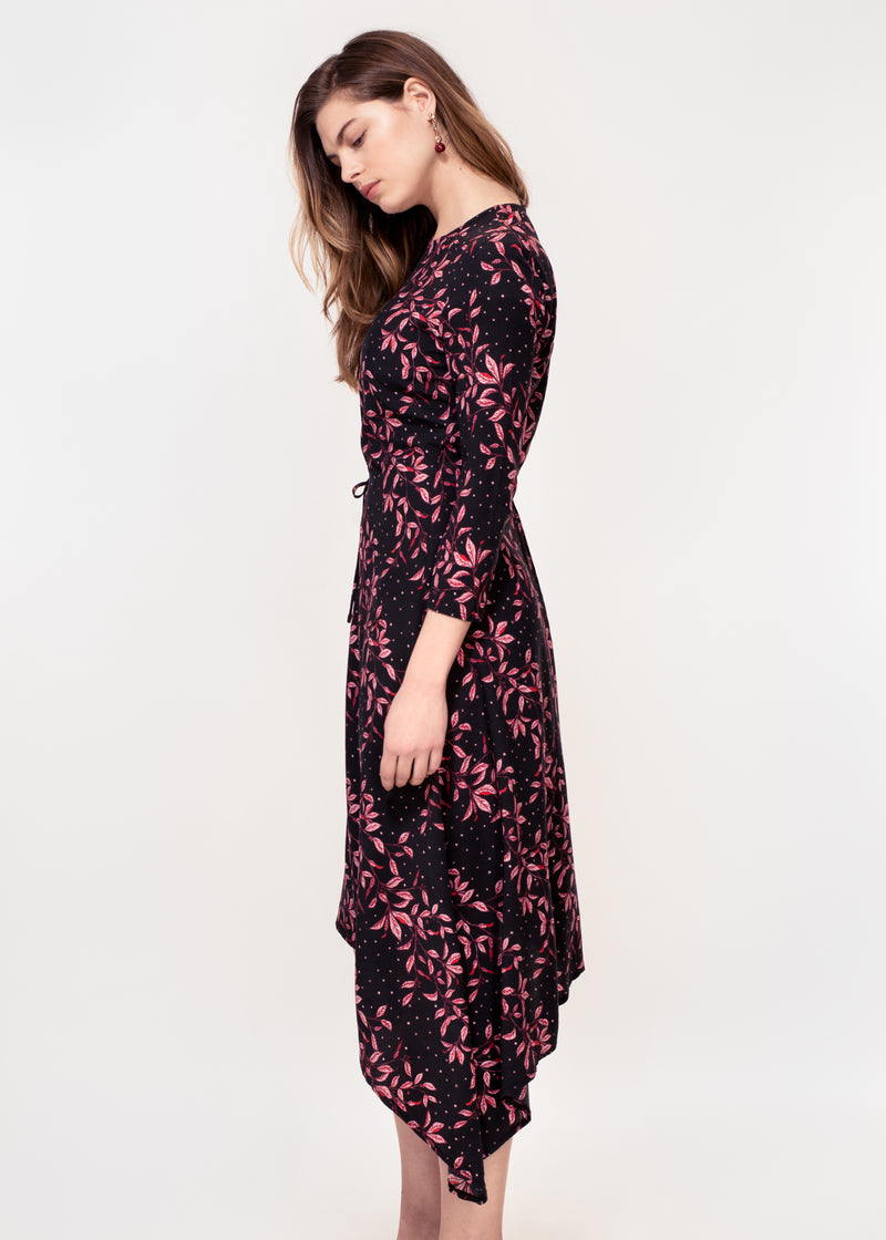 3/4 sleeve dress with asymmetric hem in a black ground pink leaf print